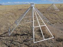 Each antenna assembly has two coaxial cable feedlines and one power cable. The antennas are manufactured by Burns Industries in Nashua, New Hampshire and assembled on-site. The shape of the dipole “blade” elements increases the antenna bandwidth.