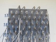 LWA1 equipment enclosure cable entrance panel. Each of the 257 dipoles has a dedicated coaxial cable and they each enter the enclosure through a lightning arrestor shown here.