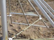 Detail view of the mechanical supports for one half of a dipole at LWA1.